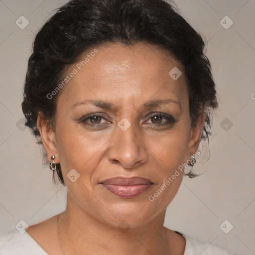 Joyful black adult female with medium  brown hair and brown eyes