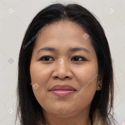 Joyful asian young-adult female with long  brown hair and brown eyes