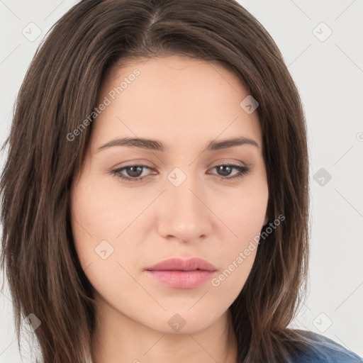 Neutral white young-adult female with long  brown hair and brown eyes