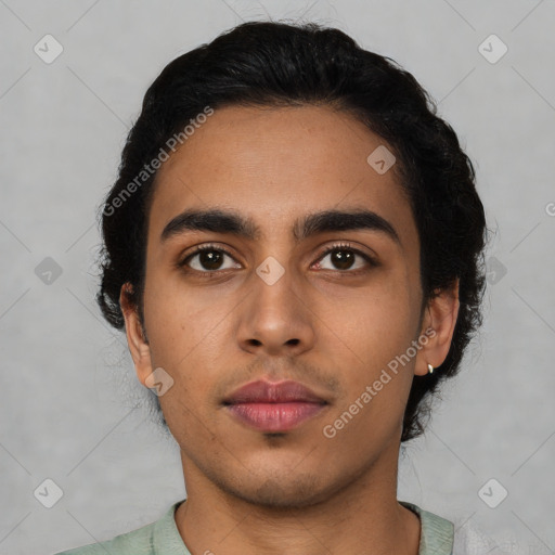 Neutral latino young-adult male with short  black hair and brown eyes