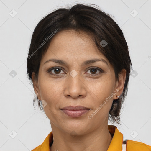 Joyful white adult female with medium  brown hair and brown eyes