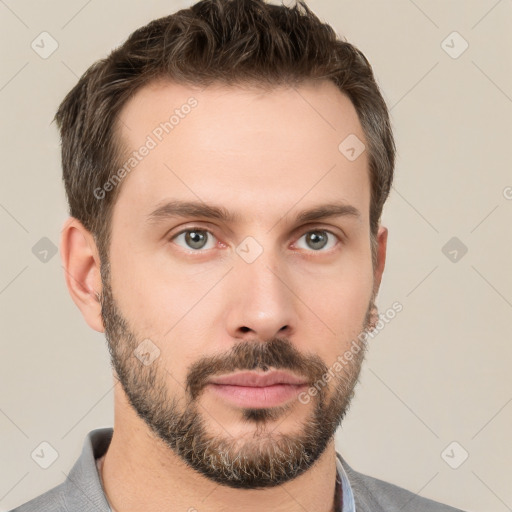 Neutral white young-adult male with short  brown hair and brown eyes