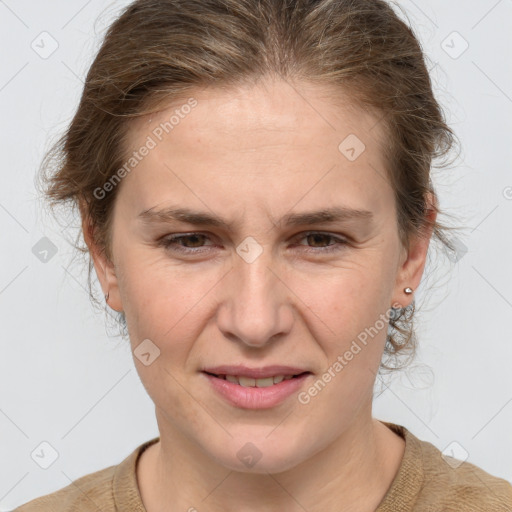 Joyful white adult female with short  brown hair and brown eyes