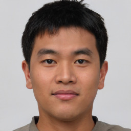 Neutral asian young-adult male with short  brown hair and brown eyes