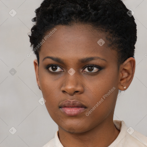 Neutral black young-adult female with short  brown hair and brown eyes