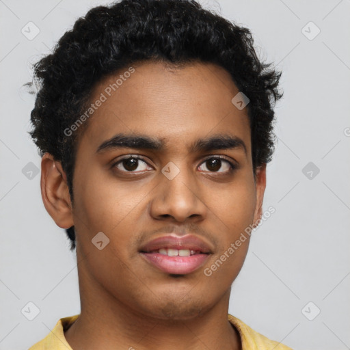 Joyful black young-adult male with short  brown hair and brown eyes