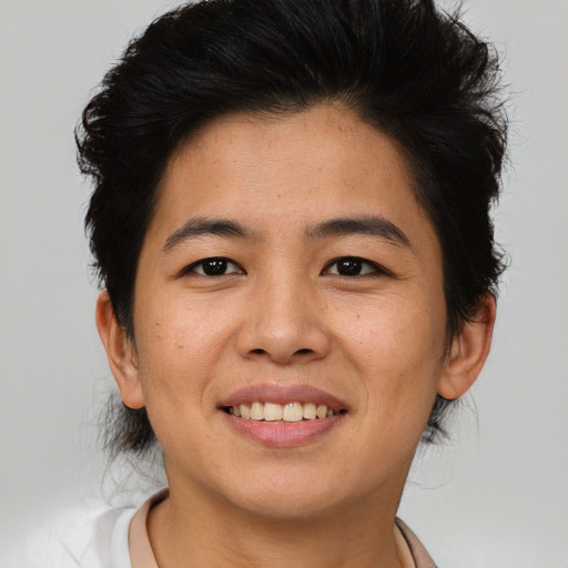 Joyful asian young-adult female with short  brown hair and brown eyes
