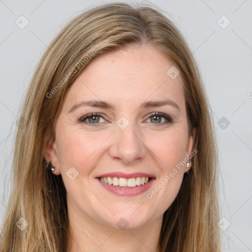 Joyful white young-adult female with long  brown hair and grey eyes