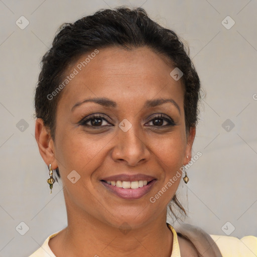 Joyful latino young-adult female with short  brown hair and brown eyes