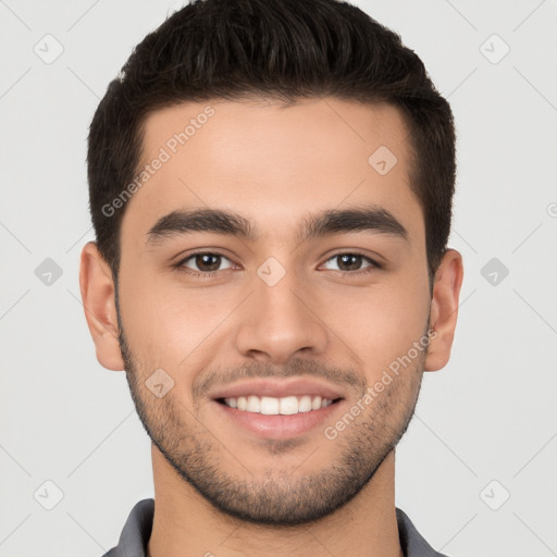 Joyful white young-adult male with short  brown hair and brown eyes