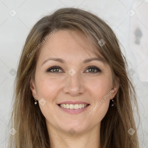 Joyful white young-adult female with long  brown hair and green eyes