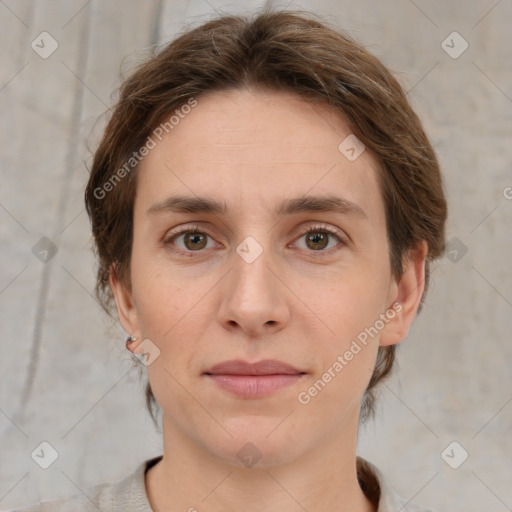 Joyful white young-adult female with short  brown hair and grey eyes