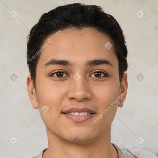 Joyful latino young-adult male with short  brown hair and brown eyes