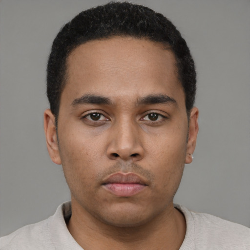 Neutral black young-adult male with short  black hair and brown eyes
