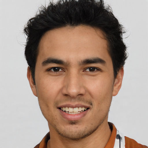 Joyful asian young-adult male with short  brown hair and brown eyes