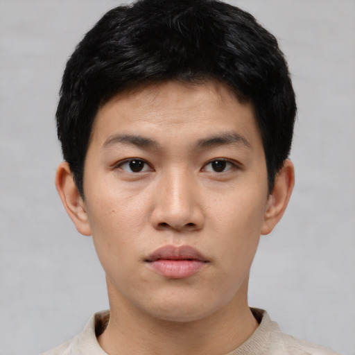 Neutral asian young-adult male with short  black hair and brown eyes