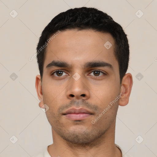 Neutral latino young-adult male with short  black hair and brown eyes