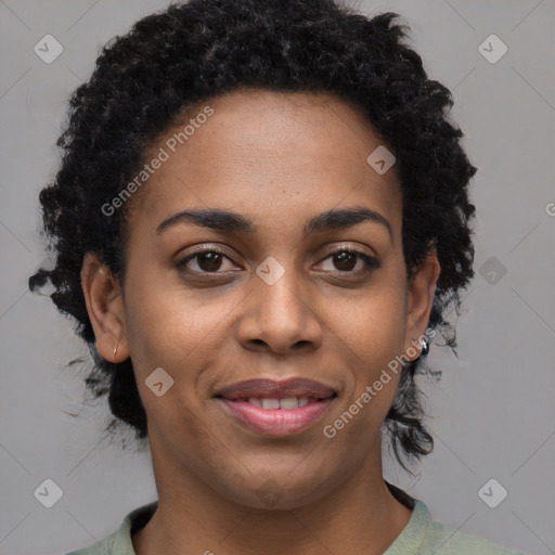 Joyful black young-adult female with medium  brown hair and brown eyes