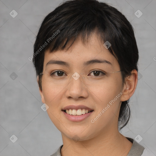 Joyful asian young-adult female with short  brown hair and brown eyes