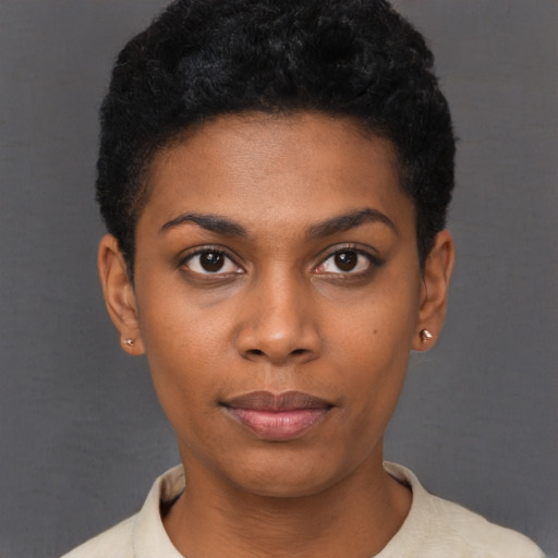 Neutral black young-adult female with short  black hair and brown eyes