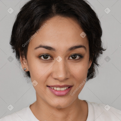 Joyful latino young-adult female with short  brown hair and brown eyes