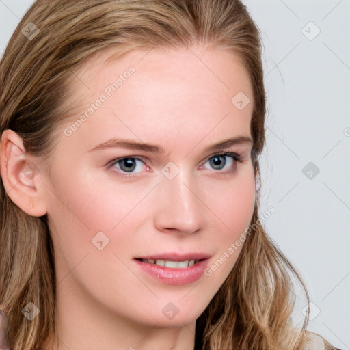 Joyful white young-adult female with long  brown hair and blue eyes