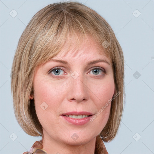 Joyful white adult female with medium  brown hair and blue eyes