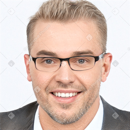 Joyful white adult male with short  brown hair and grey eyes