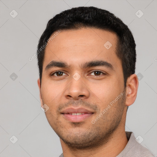 Neutral latino young-adult male with short  black hair and brown eyes