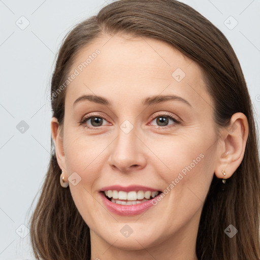 Joyful white young-adult female with long  brown hair and grey eyes