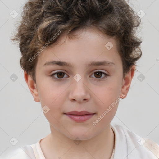 Joyful white child male with short  brown hair and brown eyes