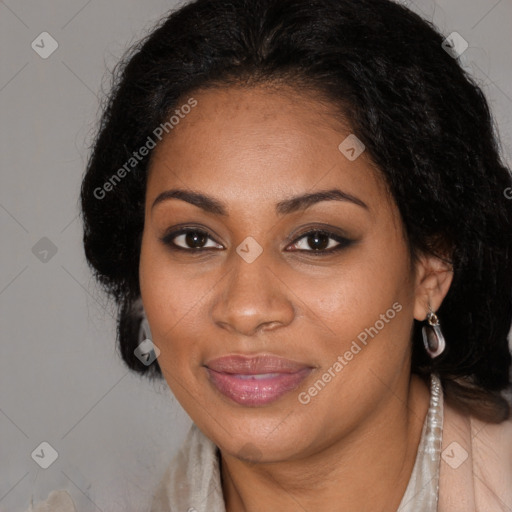 Joyful black young-adult female with long  brown hair and brown eyes