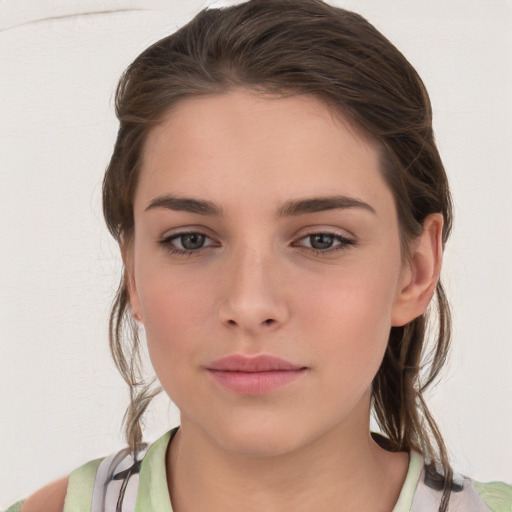 Neutral white young-adult female with medium  brown hair and grey eyes