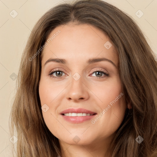 Joyful white young-adult female with long  brown hair and green eyes