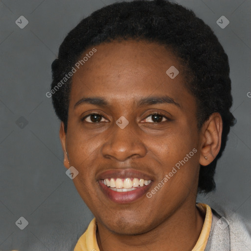 Joyful black young-adult female with short  brown hair and brown eyes