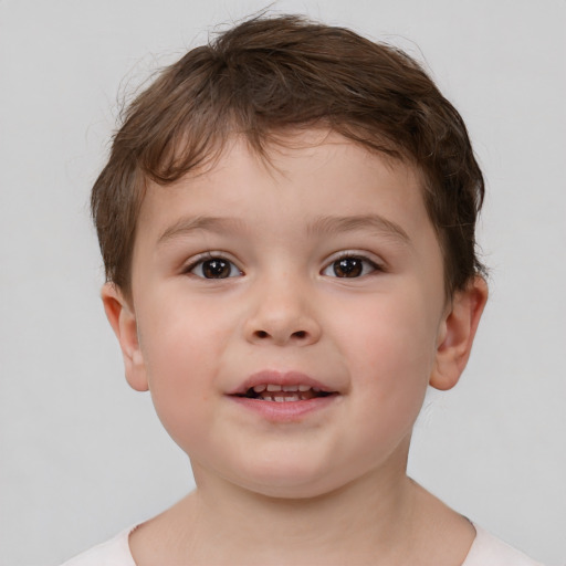 Joyful white child male with short  brown hair and brown eyes