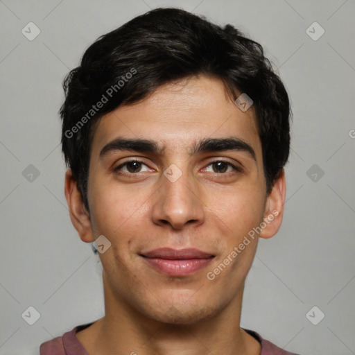 Joyful white young-adult male with short  black hair and brown eyes