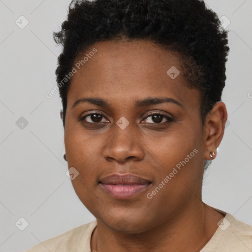 Joyful black young-adult female with short  brown hair and brown eyes