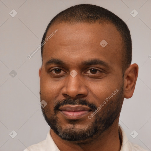 Joyful latino adult male with short  black hair and brown eyes