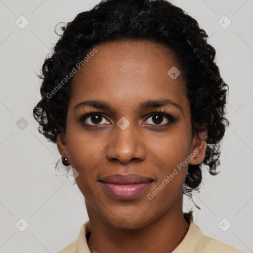 Joyful black young-adult female with short  black hair and brown eyes