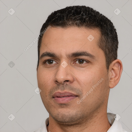 Neutral white young-adult male with short  black hair and brown eyes