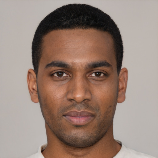 Neutral black young-adult male with short  black hair and brown eyes