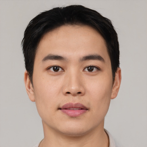 Neutral asian young-adult male with short  black hair and brown eyes