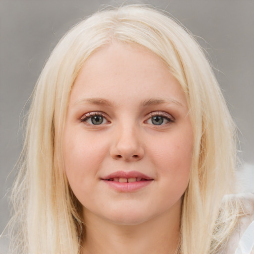 Joyful white young-adult female with medium  blond hair and blue eyes