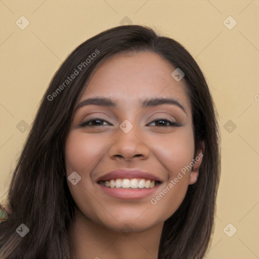 Joyful latino young-adult female with long  black hair and brown eyes