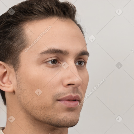 Neutral white young-adult male with short  brown hair and brown eyes