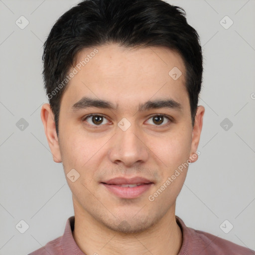 Joyful white young-adult male with short  black hair and brown eyes