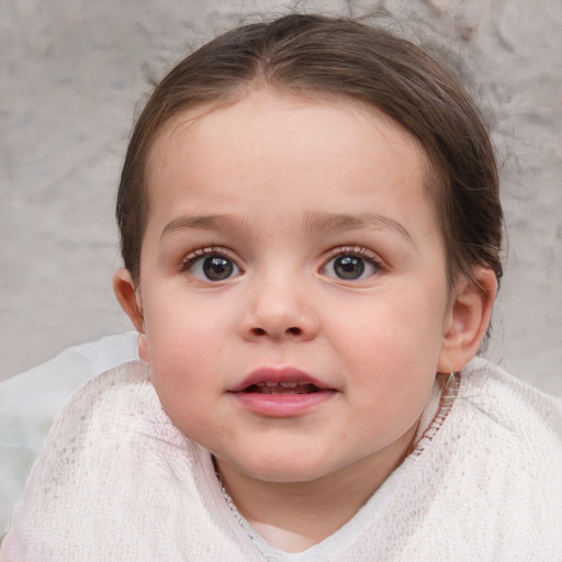 Joyful white child female with medium  brown hair and blue eyes