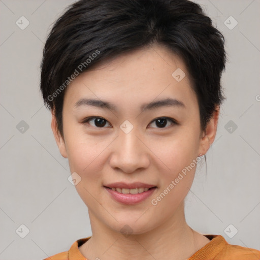 Joyful asian young-adult female with short  brown hair and brown eyes