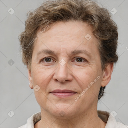 Joyful white middle-aged female with short  brown hair and brown eyes